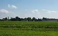 Stephansposching von Westen, im Hintergrund der Schlot von Südzucker Plattling