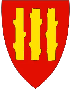 rotes Wappen mit drei goldenen Baumstämmen