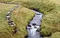 Der Bach Dalsá, der sich bei Gásadalur als Wasserfall in der Atlantik ergießt.