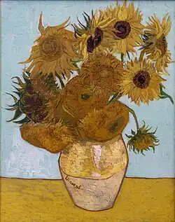 Zwölf Sonnenblumen in einer Vase