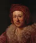 Mann mit Pelzkragen