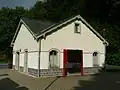 Zur Wartehalle umgebautes ehemaliges Wirtschaftsgebäude des Bahnhof Tharandt
