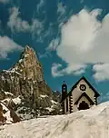 Cimon della Pala mit der Kirche am Rollepass