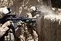 Marines vom 2. Battalion, 8. Marines schießen am 3. Juli 2009 auf eine feindliche Position in Garmsir