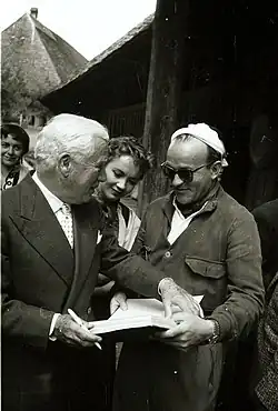 Franz Schnyder, rechts und Charlie Chaplin links, dahinter Liselotte Pulver, Foto: Ders.