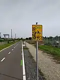 Ein Schild weist auf eine Ausfahrt von Abschnitt 9 hin, um Abschnitt 10 zu erreichen.