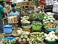 Gemüseverkäuferin auf dem Markt