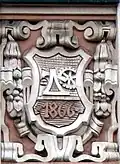 Stadtwappen von Kattowitz an der Fassade eines städtischen Bürgerhauses