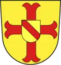 schwebendes rotes Mühleisenkreuz, belegt mit einem goldenen Herzschild