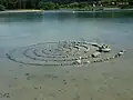 Spirale im Rhein vor der Insel
