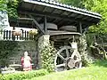 Das alte Mühlengetriebe steht heute im Garten