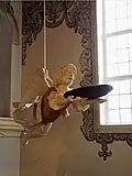 Der hölzerne Engel mit der Taufschale