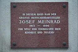 Gedenktafel am Geburtshaus Meinrads am Haus Ferchergasse 17 (2018)
