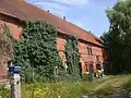 Umgebautes Gebäude des ehemaligen Gutshofs (2024)