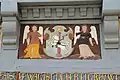 Geschnitztes Wappen am Fachwerk des Rathauses (1609)