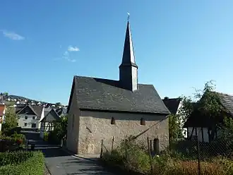 Wommelshausen, (Alte Kirche Wommelshausen), verm. Bauzeit 10./11. Jh., Reparaturmaßnahmen 1269/1274 belegt[55]