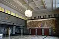 Zentrum – Aula im KG1 mit Prometheus-Fresko von Bühler 1912