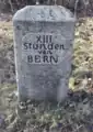 Letzter Stundenstein der Route Bern–Gemmipass am Ortseingang von Kandersteg