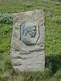 Denkmal für Sigríður Tómasdóttir beim Wasserfall